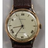 A gentleman's 18ct gold Marvin non magnetic manual wind wrist watch.