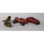 Two Schuco cars and two wind-up animals