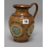 A Royal Doulton stoneware jug height 18cm