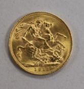 A George V sovereign, 1915, slight edge wear otherwise EF