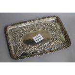 A late Victorian repousse silver dressing table tray by William Hutton & Sons, Birmingham, 1900,