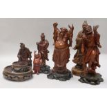 Six carved wood Chinese figures tallest 24cm