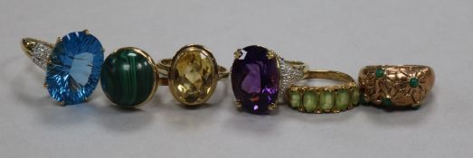 Six assorted 9ct gold and gem set rings including citrine and malachite.