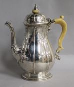 A George V silver coffee pot, retailed by Asprey, London, Adie Bros, Birmingham, 1934, gross 22.5