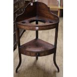 A Regency mahogany and ebony line inlaid bowfront corner washstand W.72cm