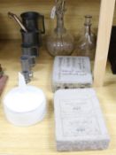 A group of assorted wine cellar related items including a set of seven French pewter measures,