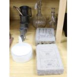 A group of assorted wine cellar related items including a set of seven French pewter measures,