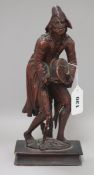 An 18th century Italian painted wood figure with a hurdy-gurdy H.29cm.