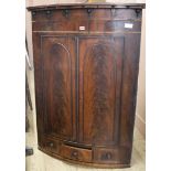 A George III mahogany bowfront corner cabinet W.88cm