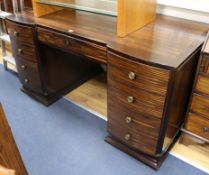 A rosewood and macassar Art Deco pedestal desk