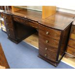 A rosewood and macassar Art Deco pedestal desk