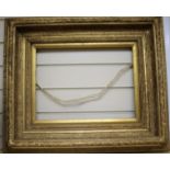 A gilt picture frame, aperture 29 x 39cm