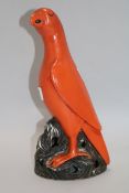 A Chinese coral red parrot height 28cm