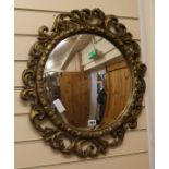 A gilt frame convex wall mirror W.56cm