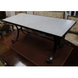 A wrought iron marble topped coffee table W.113cm