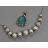 An Italian 18ct gold and graduated cultured pearl necklace and a 14ct gold and white opal pendant.