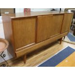 A 1960's Danish teak sideboard W.200cm.