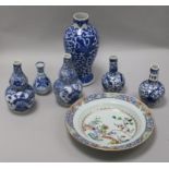 Two pairs of blue and white Chinese vases, two others and a dish tallest 23cm