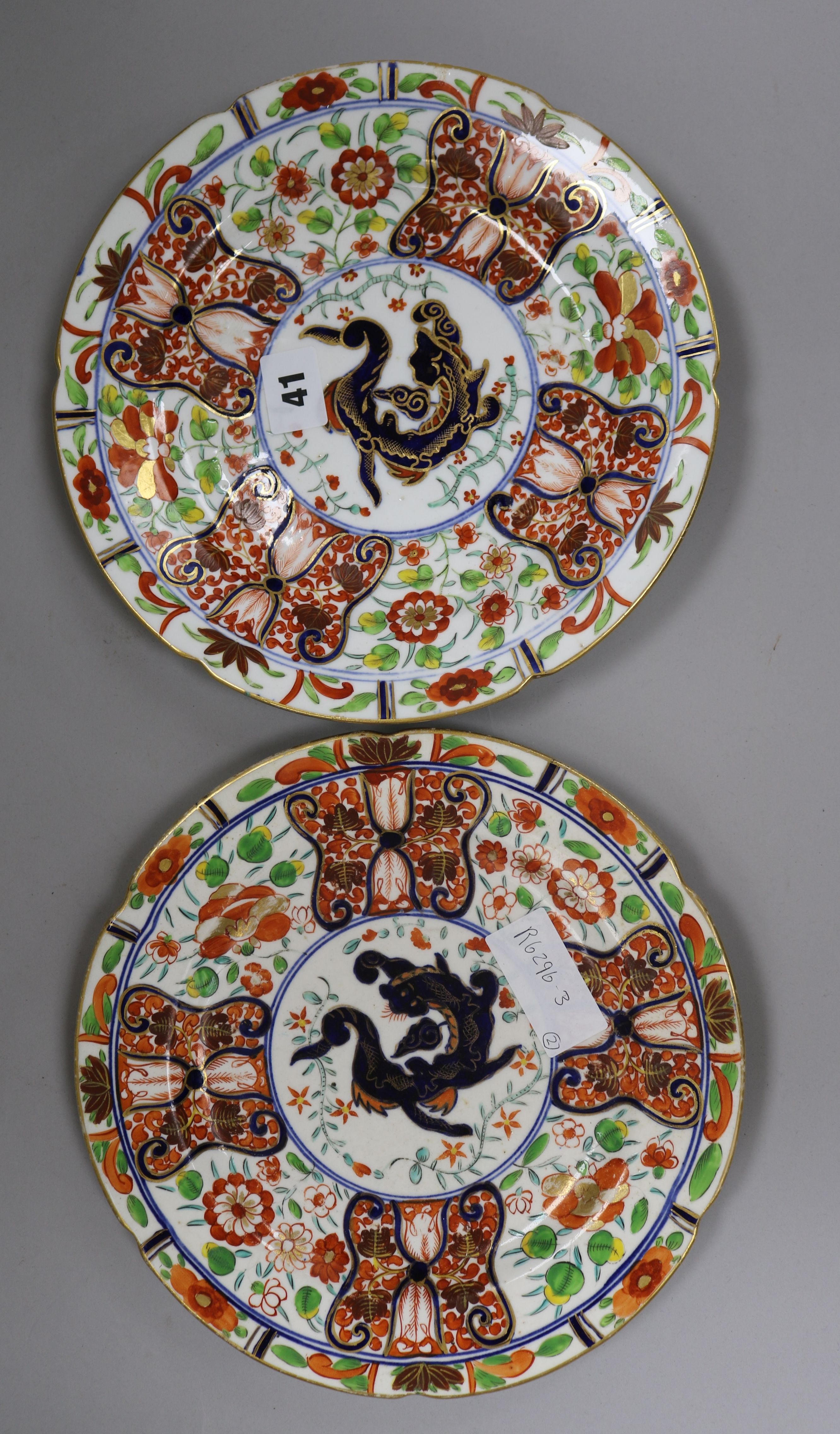 A pair of Coalport dragons in compartment plates c.1820 diameter 25.5cm