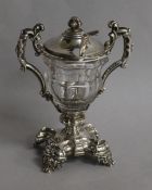 A French silver mounted cut glass mustard pot, with English silver mustard ladle.