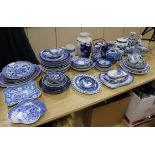 A large collection of blue and white vases