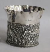 A Victorian repousse silver bottle coaster by William Comyns, London, 1892, 97mm, 4.5 oz.