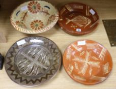 Three Brittany faience bowls and a Chris Lewis, South Heighton pottery dish (4) tallest 11cm