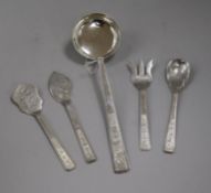Five assorted Vietnamese white metal servers including a soup ladle.