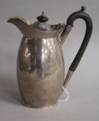 A George V silver hot water pot, Martin, Hall & Co, Sheffield, 1922, gross 13 oz.