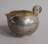 A 1920's/1930's George Jensen Danish sterling silver cream jug, no. 510, height 82mm, 140 grams.