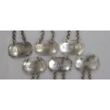 Six Victorian silver sauce/decanter labels by Rawlings & Summers; Soy & Harvey - 1842Kummel -
