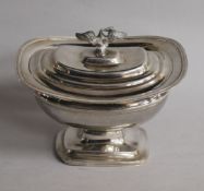 A mid 19th century Dutch silver oval footed sucrier and cover, with swan finial, French and