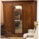 A large Victorian mahogany three door wardrobe W.192cm