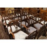 A set of fourteen Chippendale style mahogany dining chairs (eight carvers)