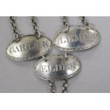 A set of 3 George III silver sauce labels; Lemon, Elder & Garlick Makers mark only double struck for