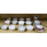 A collection of mostly Newhall tea bowls and a jug, c.1790-1800