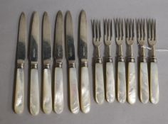A set of six pairs of George V mother of pearl handled silver dessert eaters, James Dixon & Sons,
