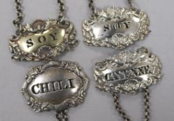 Four George III and later silver sauce labels; Cayenne & Soy - James & Nathaniel Creswick, Sheffield