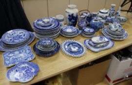 A large collection of blue and white vases