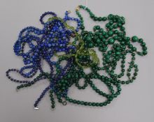 Four malachite bead necklaces with 9ct gold clasps and six other necklaces including lapis lazuli.