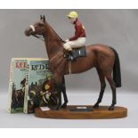 A Beswick model of Red Rum with Brian Fletcher up width 31cm height 33cm