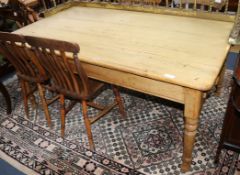 A Victorian stripped pine dining table W.167cm.
