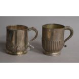 A late Victorian silver christening mug, London, 1891 and a later silver christening mug, 11.5 oz.