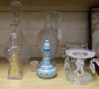 A pair of cut glass tazzas hung with lustres, a decanter and stopper, a claret jug and two scent