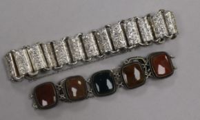 A white metal and hardstone set bracelet and an engraved link white metal bracelet.