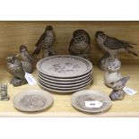 A collection of Poole Pottery bird-related models and plates and a Ken Norris resin owl, etc.