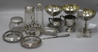 A small collection of silver, silver-mounted and plated items, including toilet jars, pepper, butter