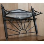 A wrought iron wall mounting hat and coat rack W.80cm