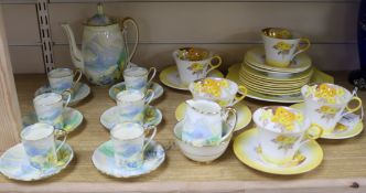 A Shelley yellow Phlox pattern part tea service and a Grafton Snowdonia coffee service, the
