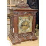 An oak bracket clock width 33cm height 47cm